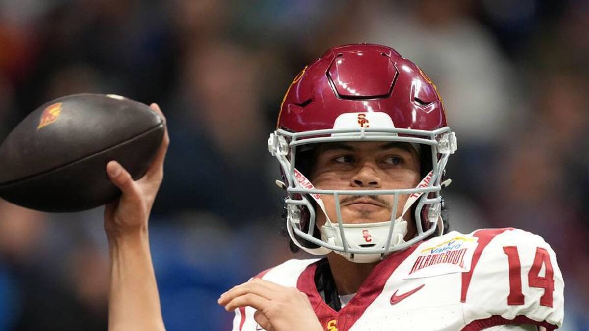  Dec 30, 2025; San Antonio, TX, USA; Southern California Trojans quarterback Jayden Maiava (14) throws the ball against the TCU Horned Frogs in the first half during the Alamo Bowl at Alamodome. Mandatory Credit: Kirby Lee-Imagn Images | Kirby Lee-Imagn Images 