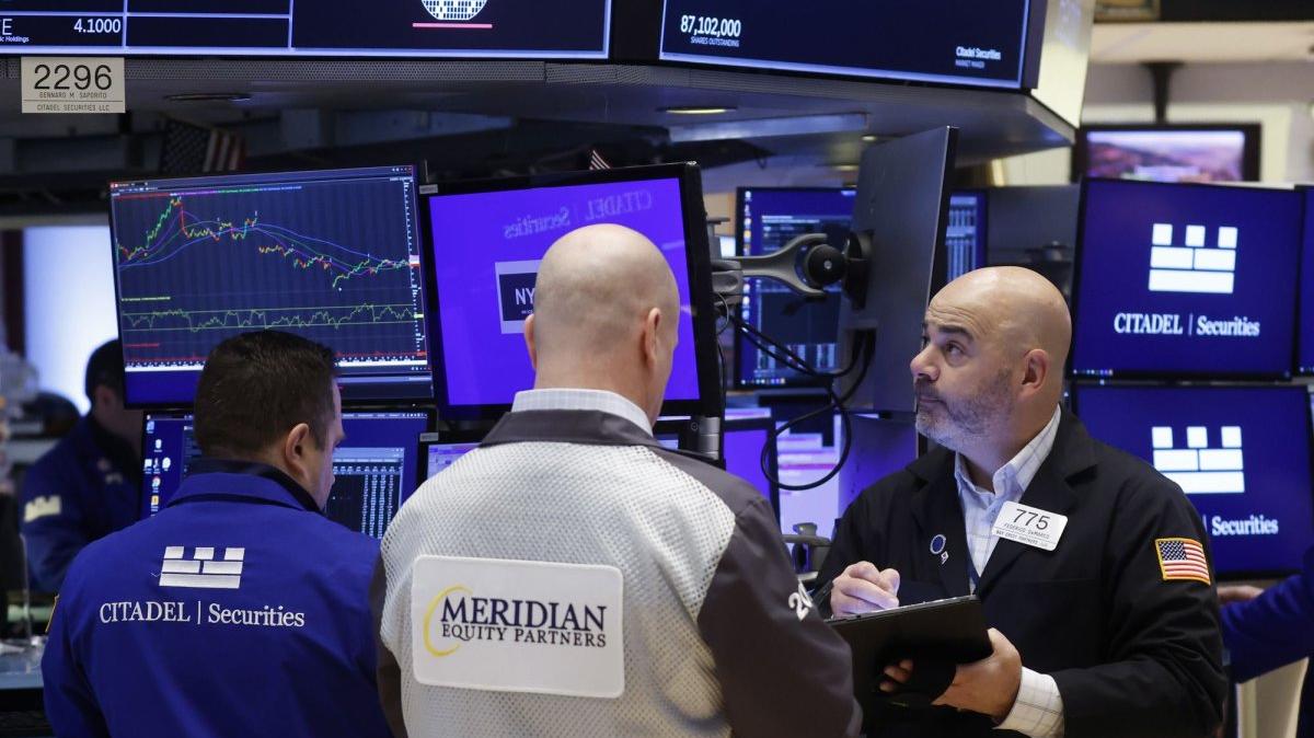 Traders work on the floor of the New York Stock Exchange on Wall Street on February 12.The NYSE had its worst one-day loss since December. Photo by John Angelillo/UPI