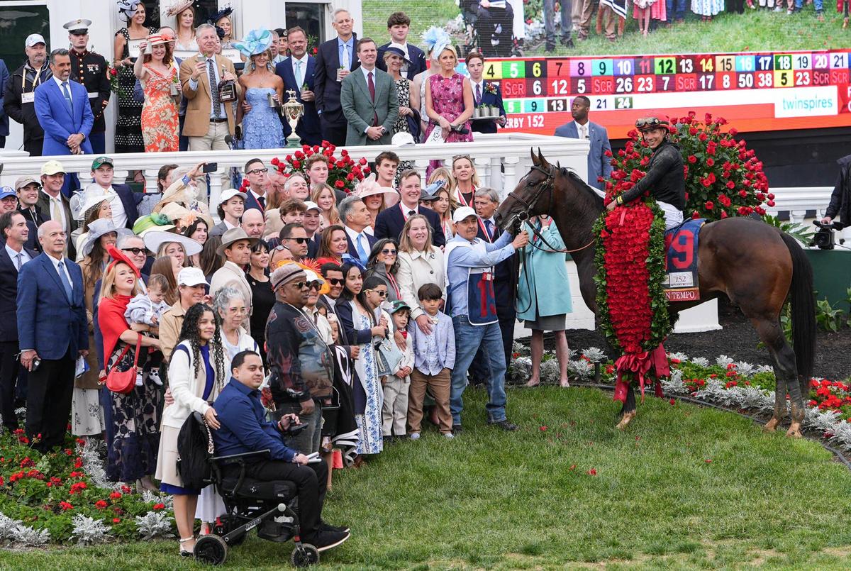  The winning team of Golden Tempo, with jockey Jose Ortiz aboard, have a group photo taken after winning the 2026 Kentucky Derby at Churchill Downs. May 2, 2026. 