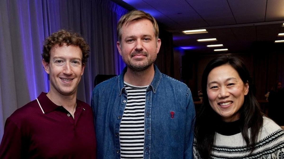 Meta CEO Mark Zuckerberg and Priscilla Chan, co-founders of Biohub, pose for a photograph with Alex Rives, head of science at Biohub, at the Biohub Imaging Institute in Redwood City, California, U.S., November 5, 2025. Biohub/Handout via REUTERS