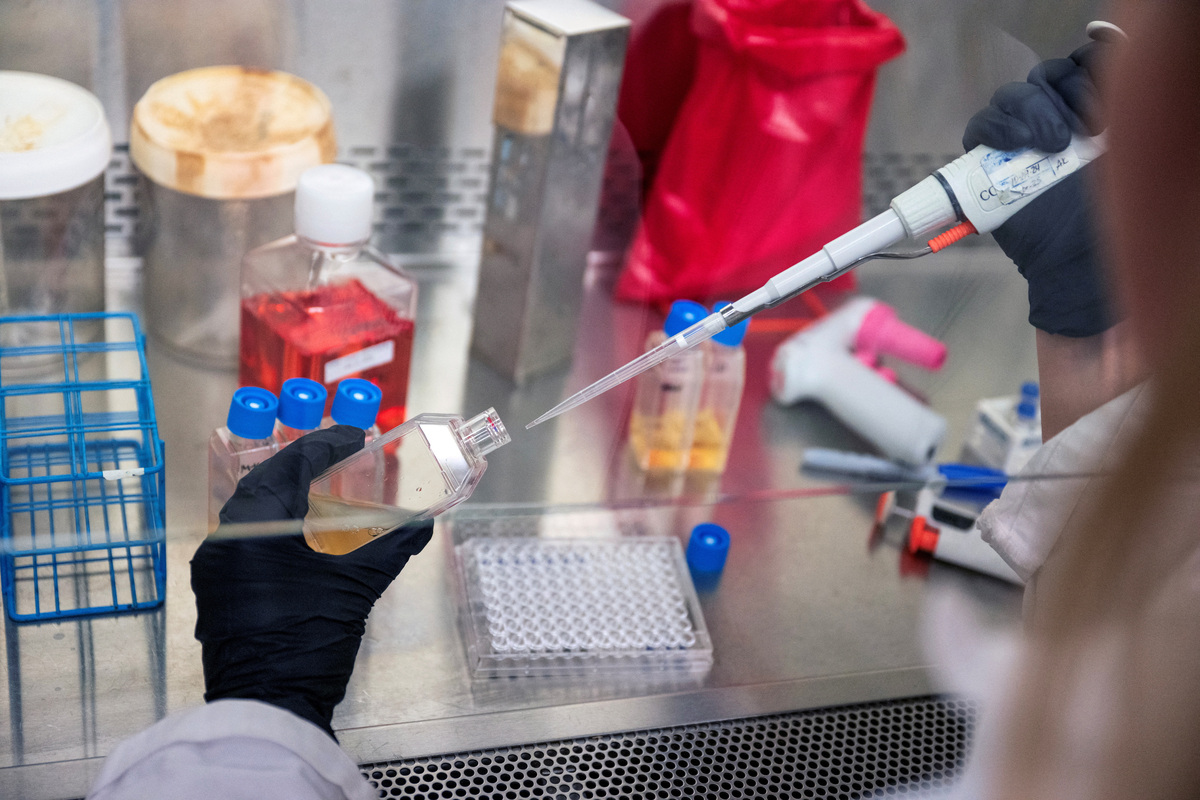 A scientist in Dr Vinod Balachandran's lab at Memorial Sloan Kettering Cancer Center uses a pipette to prepare samples, in New York City, U.S., October 15, 2025