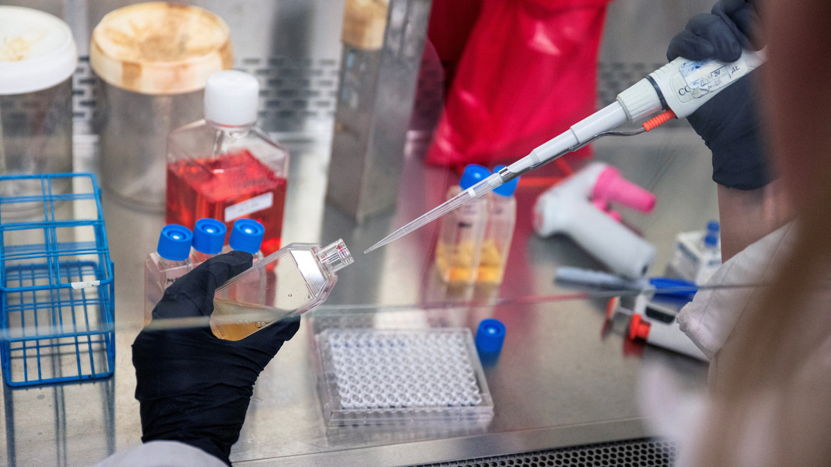 A scientist in Dr Vinod Balachandran's lab at Memorial Sloan Kettering Cancer Center uses a pipette to prepare samples, in New York City, U.S., October 15, 2025