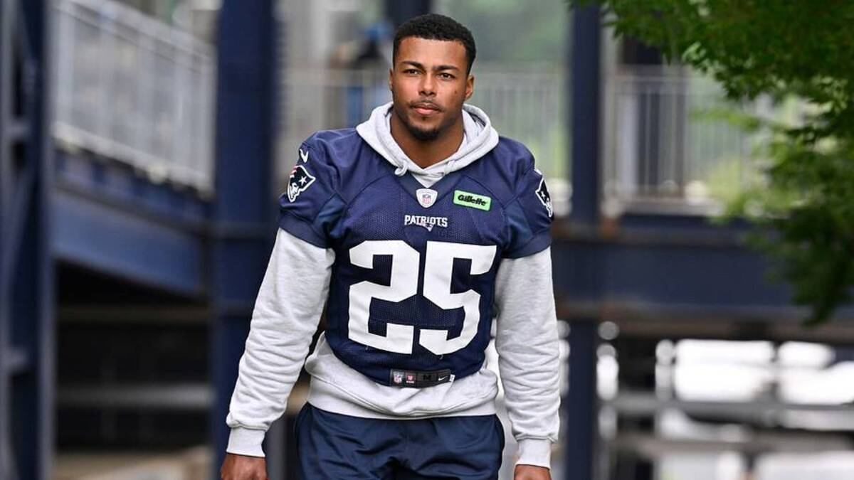  Jun 9, 2025; Foxborough, MA, USA; New England Patriots cornerback Marcus Jones (25) walks to the practice fields at Gillette Stadium. Mandatory Credit: Eric Canha-Imagn Images | IMAGN IMAGES via Reuters Connect 