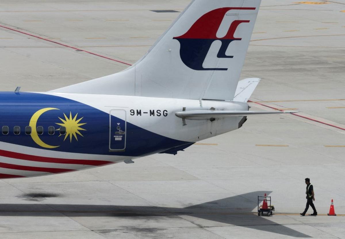 A Malaysia Airlines plane sits on the tarmac at Kuala Lumpur International Airport in Sepang, Malaysia August 28, 2024. REUTERS/Hasnoor Hussain