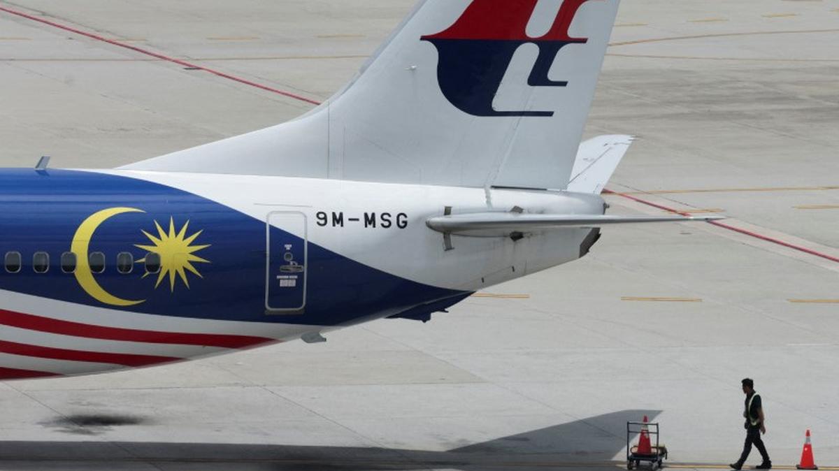 A Malaysia Airlines plane sits on the tarmac at Kuala Lumpur International Airport in Sepang, Malaysia August 28, 2024. REUTERS/Hasnoor Hussain