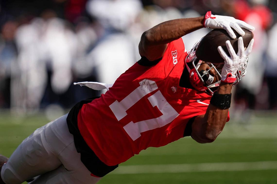  Ohio State Buckeyes wide receiver Carnell Tate catches a touchdown pass during his team's game against the Penn State Nittany Lions in Columbus, Ohio, on Nov. 1, 2025. Adam Cairns / Columbus Dispatch / USA TODAY NETWORK via Imagn Images