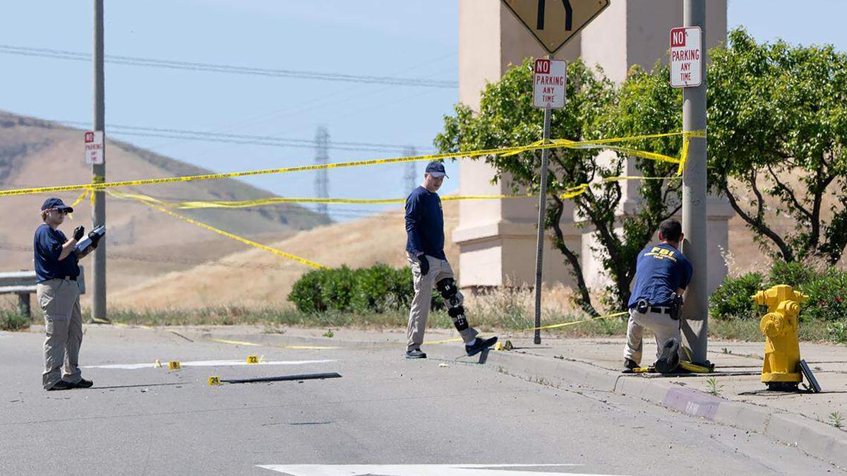 Members of the FBI evidence response team investigate an ICE shooting on Sperry Avenue in Patterson, California, on April 7, 2026.