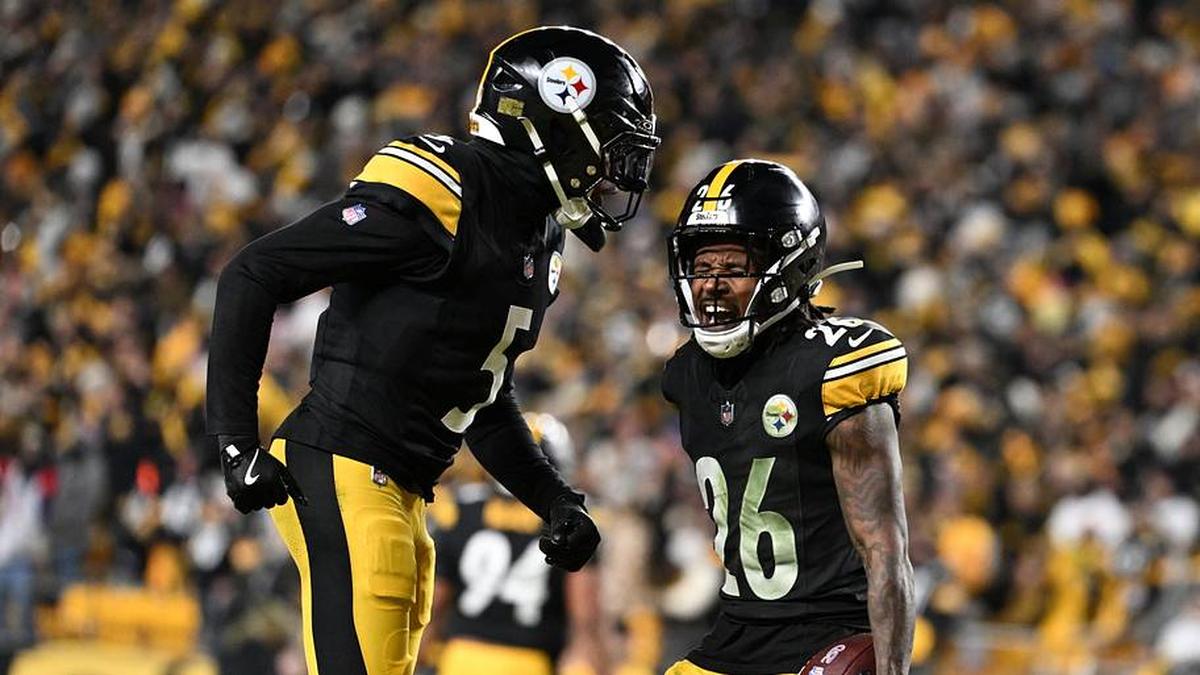  Jan 12, 2026; Pittsburgh, PA, USA; Pittsburgh Steelers cornerback Brandin Echols (26) and cornerback Jalen Ramsey (5) celebrate after a play during the second half of an AFC Wild Card Round game against the Houston Texans at Acrisure Stadium. Mandatory Credit: Barry Reeger-Imagn Images | Barry Reeger-Imagn Images 