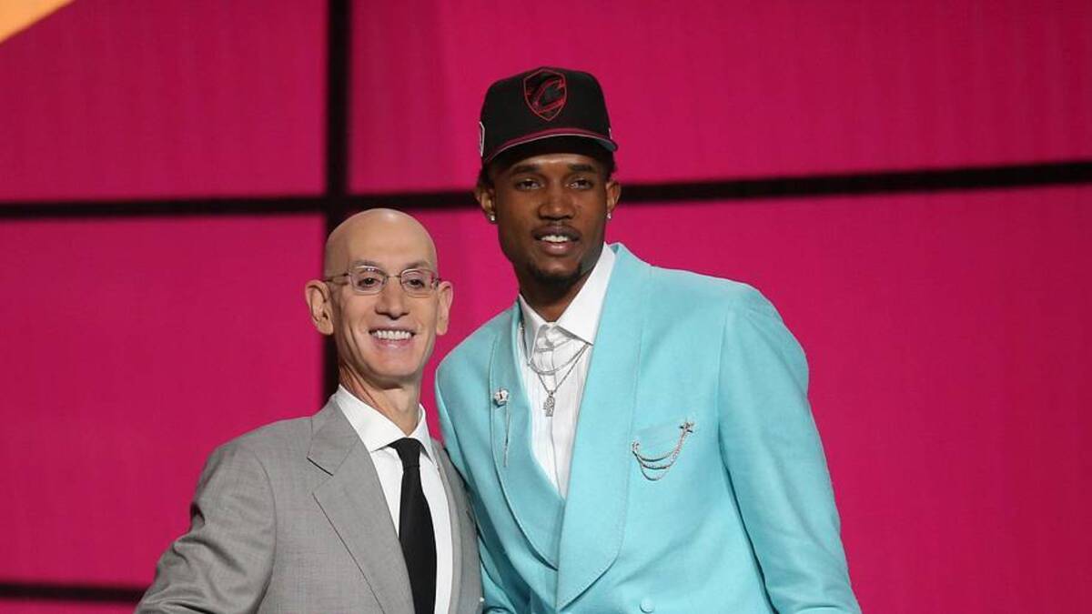  Jul 29, 2021; Brooklyn, New York, USA; Evan Mobley (USC) poses with NBA commissioner Adam Silver after being selected as the number three overall pick by the Cleveland Cavaliers in the first round of the 2021 NBA Draft at Barclays Center. Mandatory Credit: Brad Penner-Imagn Images | Brad Penner-Imagn Images 