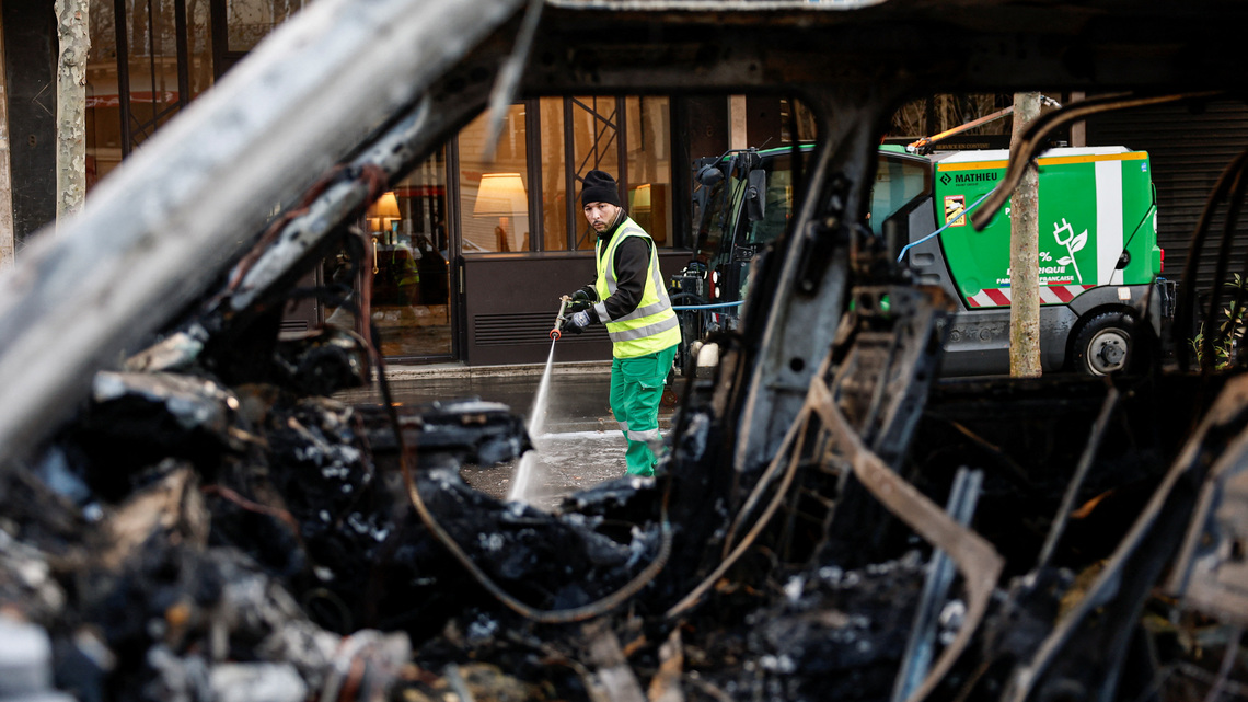 Macron urges calm as France counts the cost of worst unrest in years 
