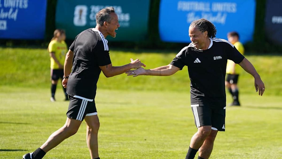  Cobi Jones (right) is pushing the USMNT stars to embrace the 2026 World Cup spotlight. | Rich Lam/FIFA/Getty Images 