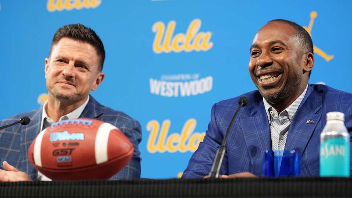  Dec 9, 2025; Los Angeles, CA, USA; UCLA Bruins football coach Bob Chesney (left) and athletic director Martin Jarmond at introductory press conference at Renee Luskin Conference Center Centennial Ballroom. Mandatory Credit: Kirby Lee-Imagn Images | Kirby Lee-Imagn Images 