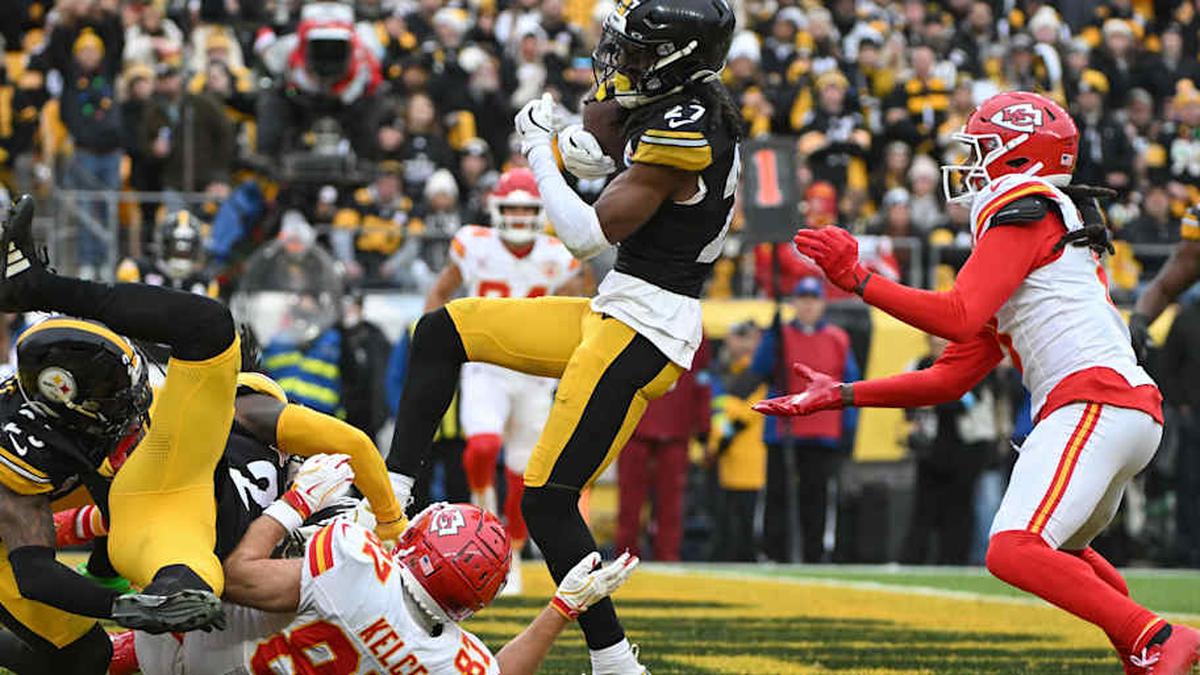  Dec 25, 2024; Pittsburgh, Pennsylvania, USA; Pittsburgh Steelers cornerback Cory Trice Jr. (27) intercepts a pass intended for Kansas City Chiefs tight end Travis Kelce (87) during the second half at Acrisure Stadium. Mandatory Credit: Barry Reeger-Imagn Images | Barry Reeger-Imagn Images 
