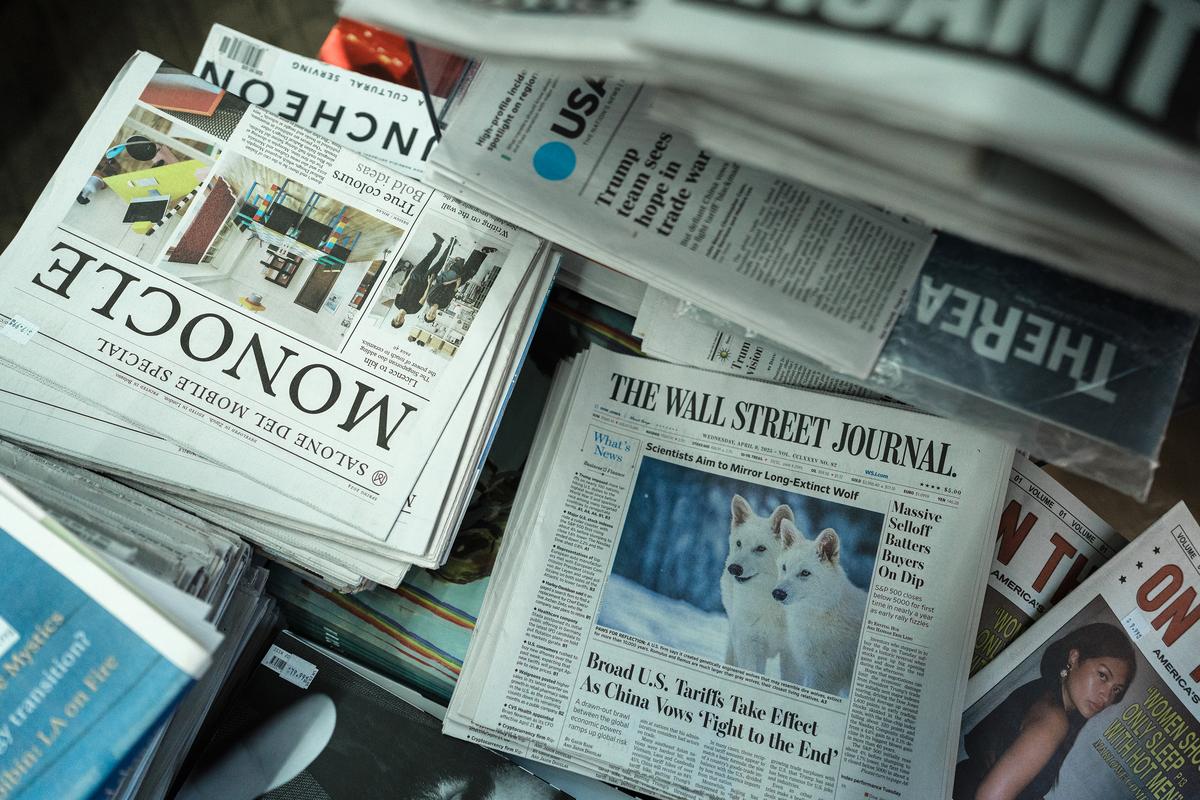 FILE -- Copies of The Wall Street Journal for sale in New York, April 9, 2025. President Donald Trump on Wednesday refiled his $10 billion defamation lawsuit against the publisher of The Wall Street Journal over an article about a birthday book greeting to the sex offender Jeffrey Epstein. (Juan Arredondo/The New York Times)