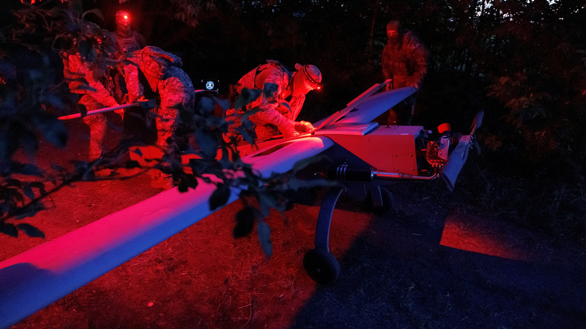 Service members of the Sparta company of the 422nd Unmanned Systems Regiment 'Luftwaffe' of the Ukrainian Armed Forces, prepare a Zozulia mid-strike drone for a flight while they work at a position near a front line, amid Russia's attack on Ukraine, in an undisclosed location in Southern Ukraine, on an undisclosed date, 2026. REUTERS/Valentyn Ogirenko