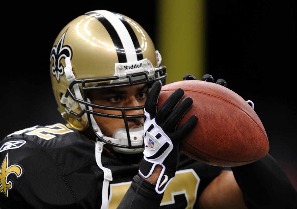  December 12, 2010; New Orleans, LA, USA; New Orleans Saints safety Darren Sharper (42) makes a catch while warming up before the start of their game against the St. Louis Rams at the Louisiana Superdome. Mandatory Credit: Chuck Cook - USA TODAY Sports 