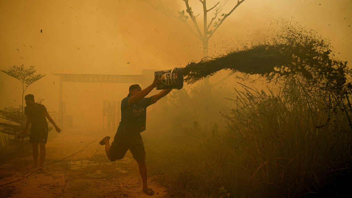 Wildfires spread into residential areas in Indonesia's Bangka Belitung, destroying over 300 houses 