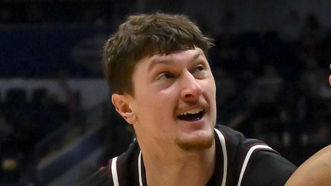  Mar 11, 2026; Nashville, TN, USA; Auburn Tigers guard Keyshawn Hall (7) strips the ball from Mississippi State Bulldogs forward Sergej Macura (11) during the second half at Bridgestone Arena. Mandatory Credit: Steve Roberts-Imagn Images | Steve Roberts-Imagn Images 