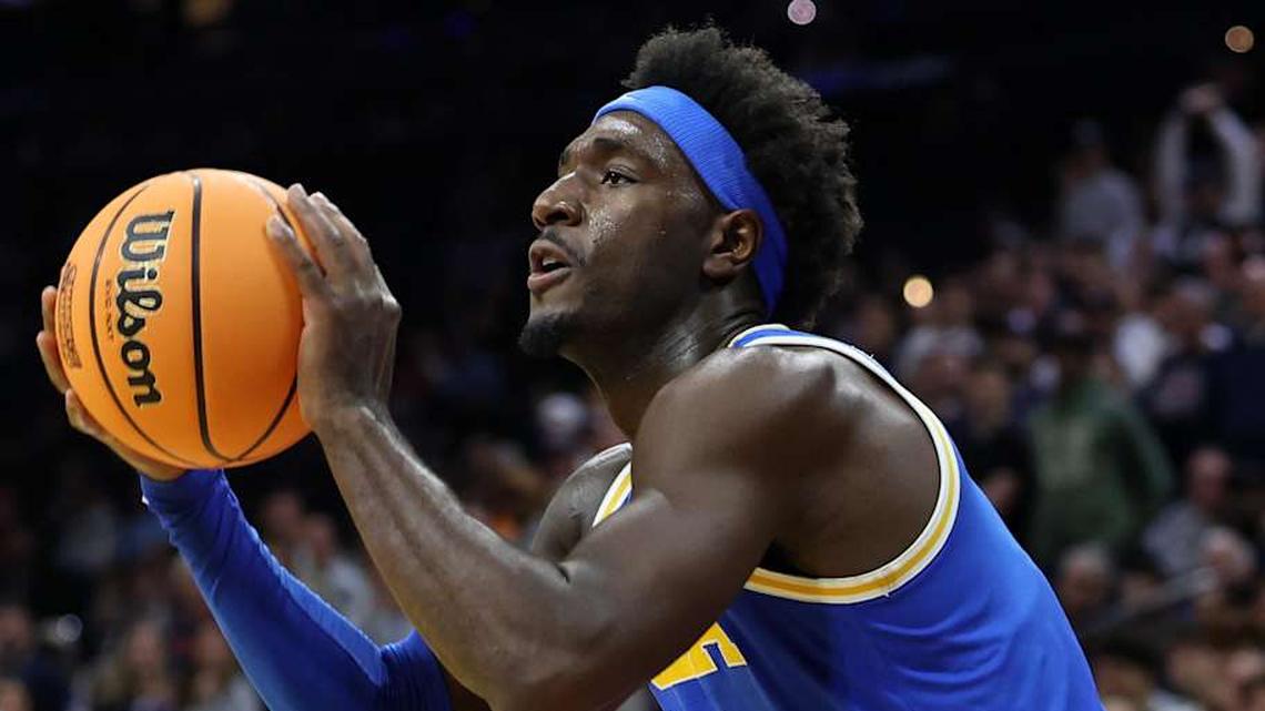  Mar 22, 2026; Philadelphia, PA, USA; UCLA Bruins forward Eric Dailey Jr. (3) shoots the ball against the UConn Huskies in the second half during a second round game of the men's 2026 NCAA Tournament at Xfinity Mobile Arena. Mandatory Credit: Bill Streicher-Imagn Images | Bill Streicher-Imagn Images 