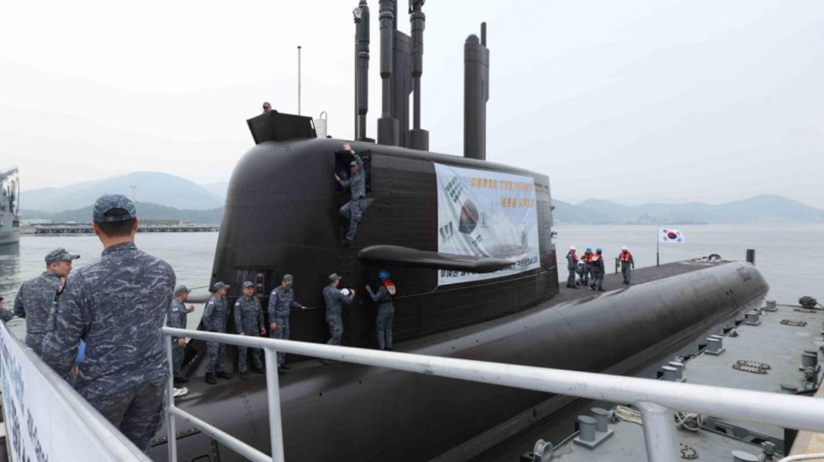 Sailors board the ROKS Dosan Ahn Chang-ho, a 3,000-ton South Korean naval submarine, at a naval port in Changwon, South Gyeongsang Province, South Korea, 25 March 2026. The submarine is departing across the Pacific for the first time to take part in joint drills with Canada in June aimed at bolstering maritime security and defense industry cooperation. Photo by YONHAP / EPA