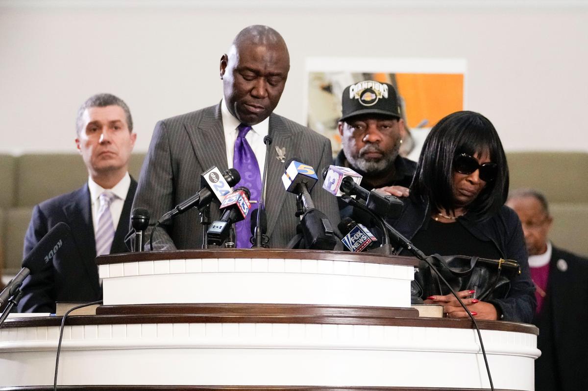 Civil rights attorney Ben Crump speaks at a news conference with the family of Tyre Nichols, who died after being beaten by Memphis police officers, as RowVaughn Wells, mother of Tyre, right, and Tyre’s stepfather Rodney Wells, along with attorney Tony Romanucci, left, also stand with Crump, in Memphis, Tenn., Monday, Jan. 23, 2023.