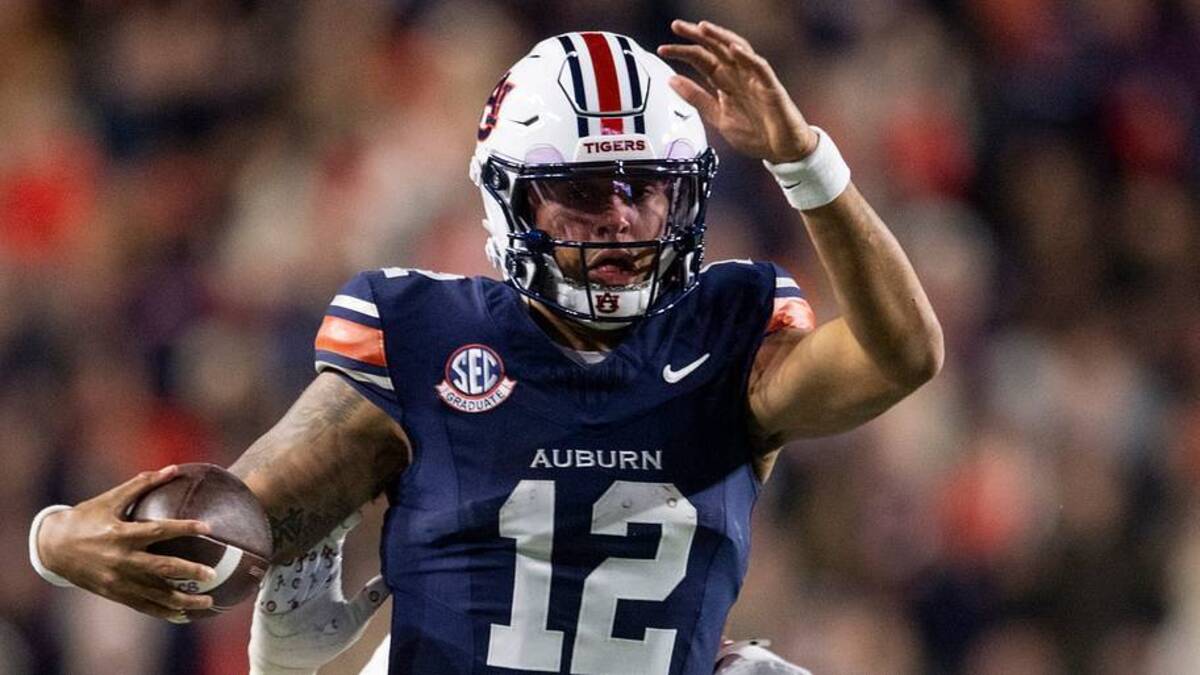  Auburn Tigers quarterback Ashton Daniels (12) runs the ball as Auburn Tigers take on Alabama Crimson Tide in the Iron Bowl at Jordan-Hare Stadium in Auburn, Ala. on Saturday, Nov. 29, 2025. Alabama Crimson Tide leads Auburn Tigers 17-6. | USA TODAY Network via Reuters Connect 