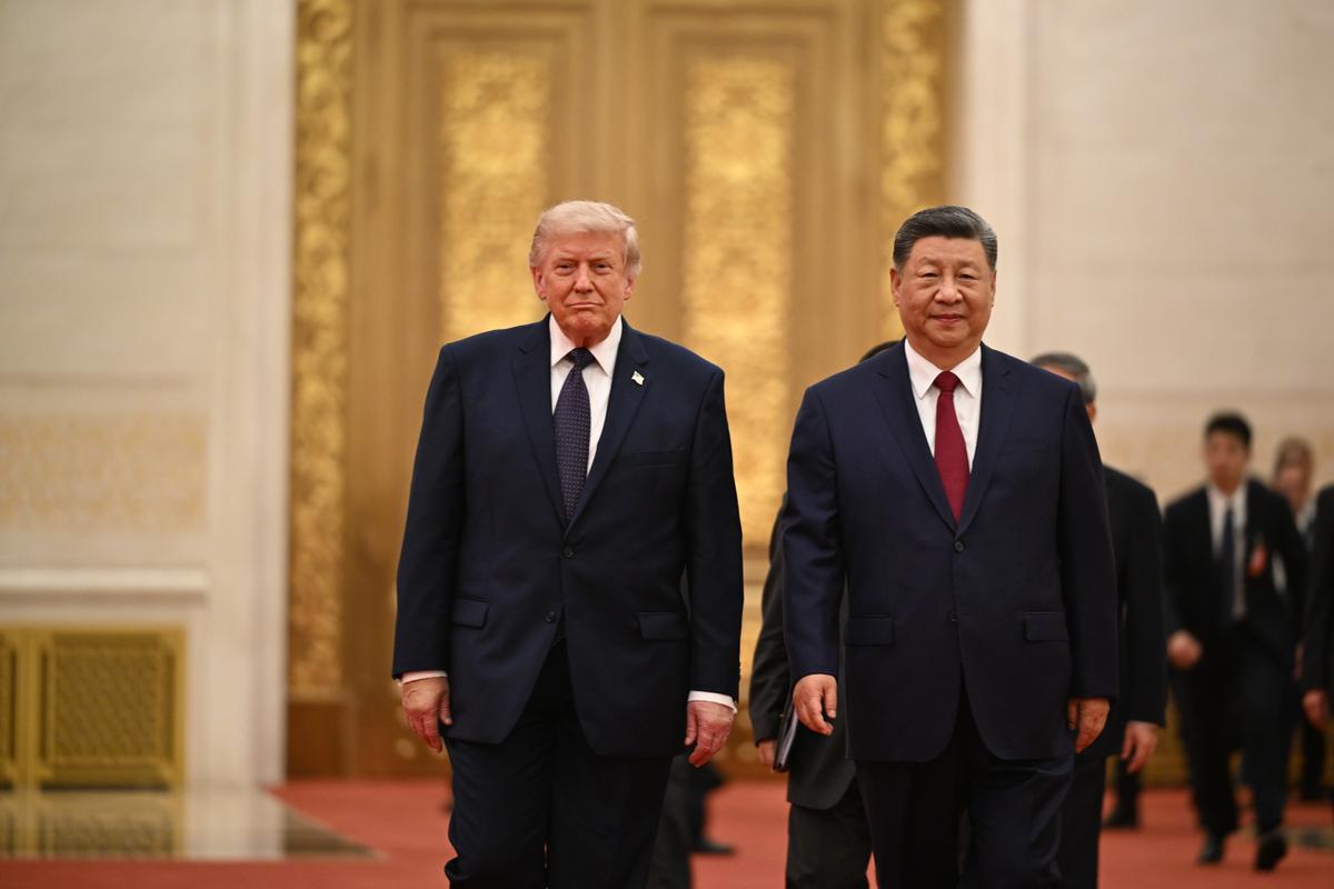 President Donald Trump and President Xi Jinping of China arrive for a state banquet at the Great Hall of the People in Beijing during their two-day summit, on Thursday, May 14, 2026. During the first U.S. presidential visit to China in nearly a decade, Xi delivered a warning on Taiwan, saying that the issue, if handled poorly, could lead to conflict and "an extremely dangerous situation." (Kenny Holston/The New York Times)..