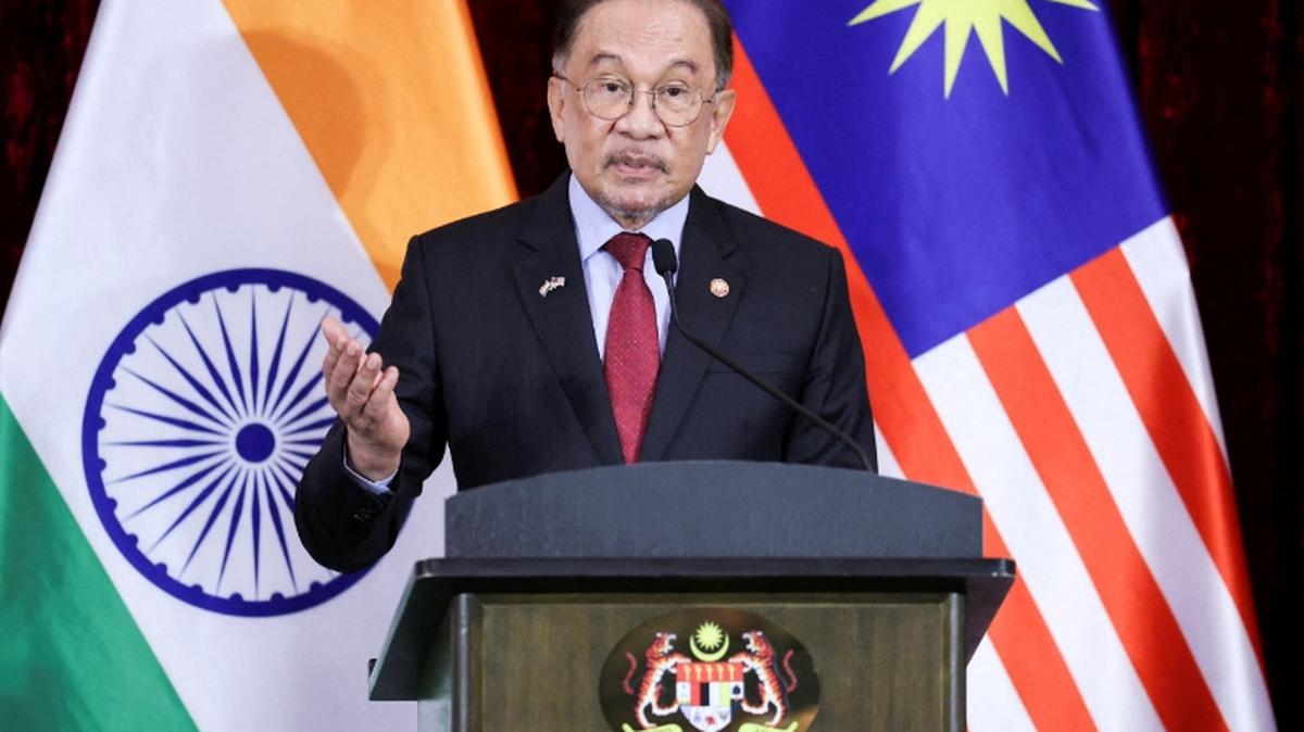 FILE PHOTO: Malaysian Prime Minister Anwar Ibrahim speaks during a press conference with India's Prime Minister Narendra Modi (not pictured), on the second day of Modi’s official visit, in Putrajaya, Malaysia, February 8, 2026. REUTERS/Hasnoor Hussain/Pool/File Photo