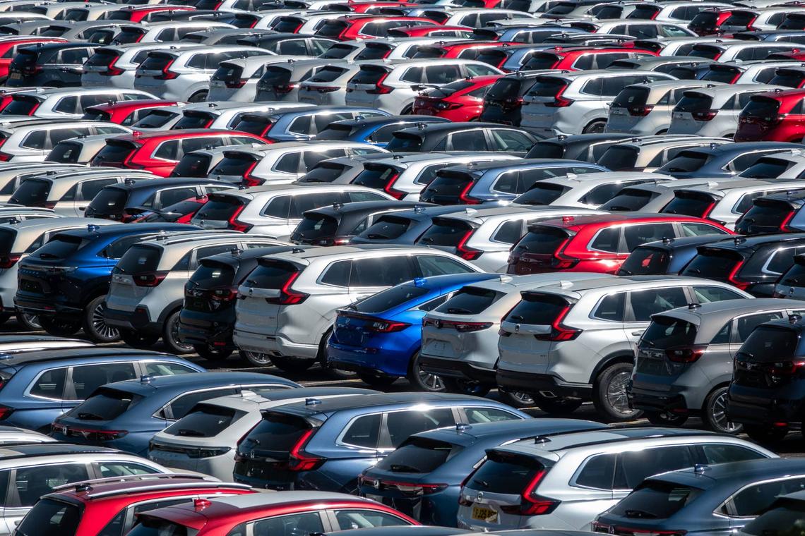  Recently imported new Honda cars are parked in a storage yard 