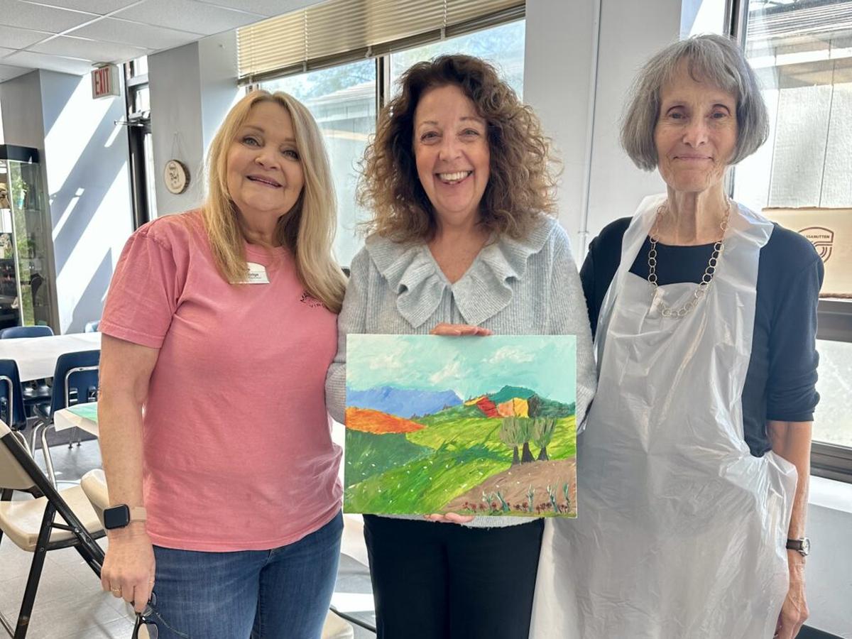 It’s no Picasso, but I had a blast painting my landscape. Photo credit: Cathy Bennett Kopf 
