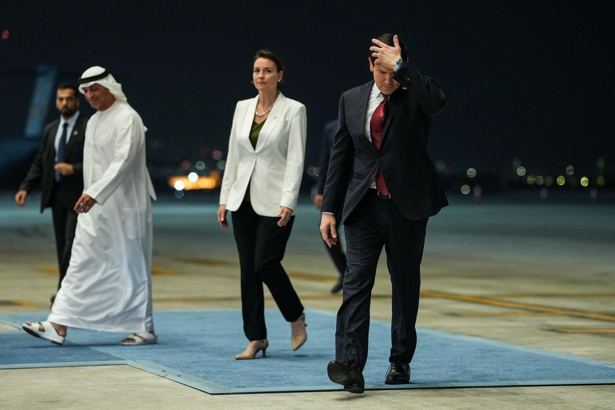 U.S. Secretary of State Marco Rubio adjusts his hair following his arrival at Al Bateen Executive Airport to discuss the interim deal between the U.S. and Iran with Arab Gulf allies, in Abu Dhabi, United Arab Emirates, June 23, 2026. REUTERS/Eric Lee/Pool