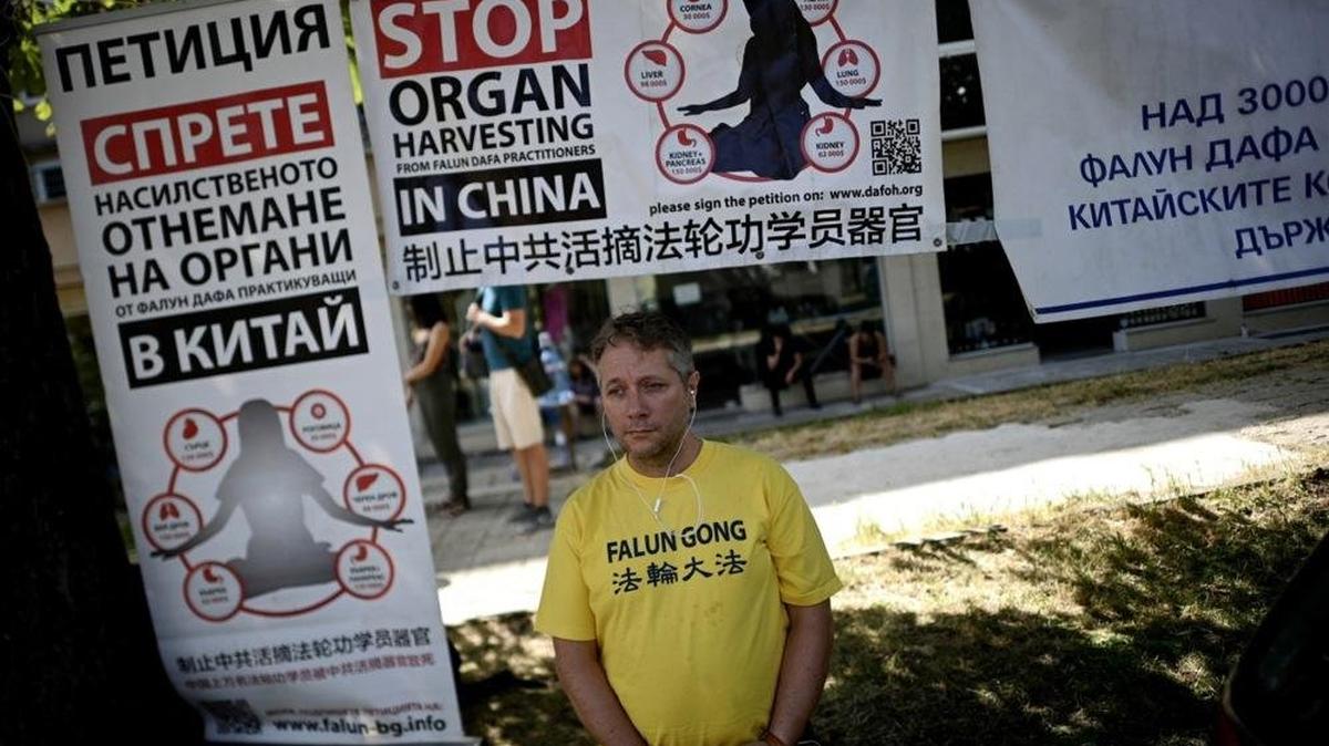 A member of the Bulgarian Falun Dafa association attends a protest in front of the Chinese embassy in Sofia, Bulgaria, in July 2023. The protest marked the 24th anniversary of the start of a massive campaign against Falun Dafa in July 1999, when the Chinese Communist regime began the repression and persecution of Falun Gong and its followers in China. File Photo by Vassil Donev/EPA