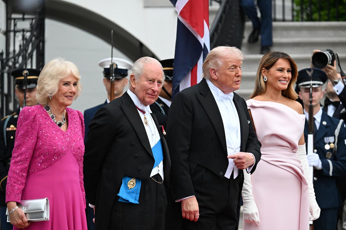 President Donald Trump and first lady Melania Trump, right, greet King Charles III and Queen Camilla of the United Kingdom as they arrive for a state dinner at the White House in Washington, on Tuesday, April 28, 2026. (Kenny Holston/The New York Times)