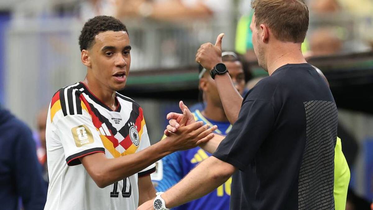  Jamal Musiala (left) helped his manager Julian Nagelsmann out. | Alexander Hassenstein/Getty Images 