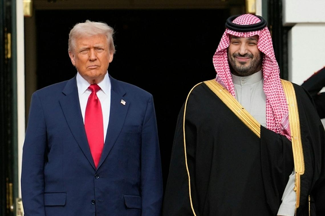  President Donald Trump stands with Saudi Arabia's Crown Prince Mohammed bin Salman on his visit to the White House on Nov. 18, 2025. AP Photo/Mark Schiefelbein, File 