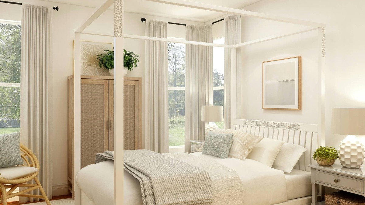 neutral bedroom with four-poster bed.