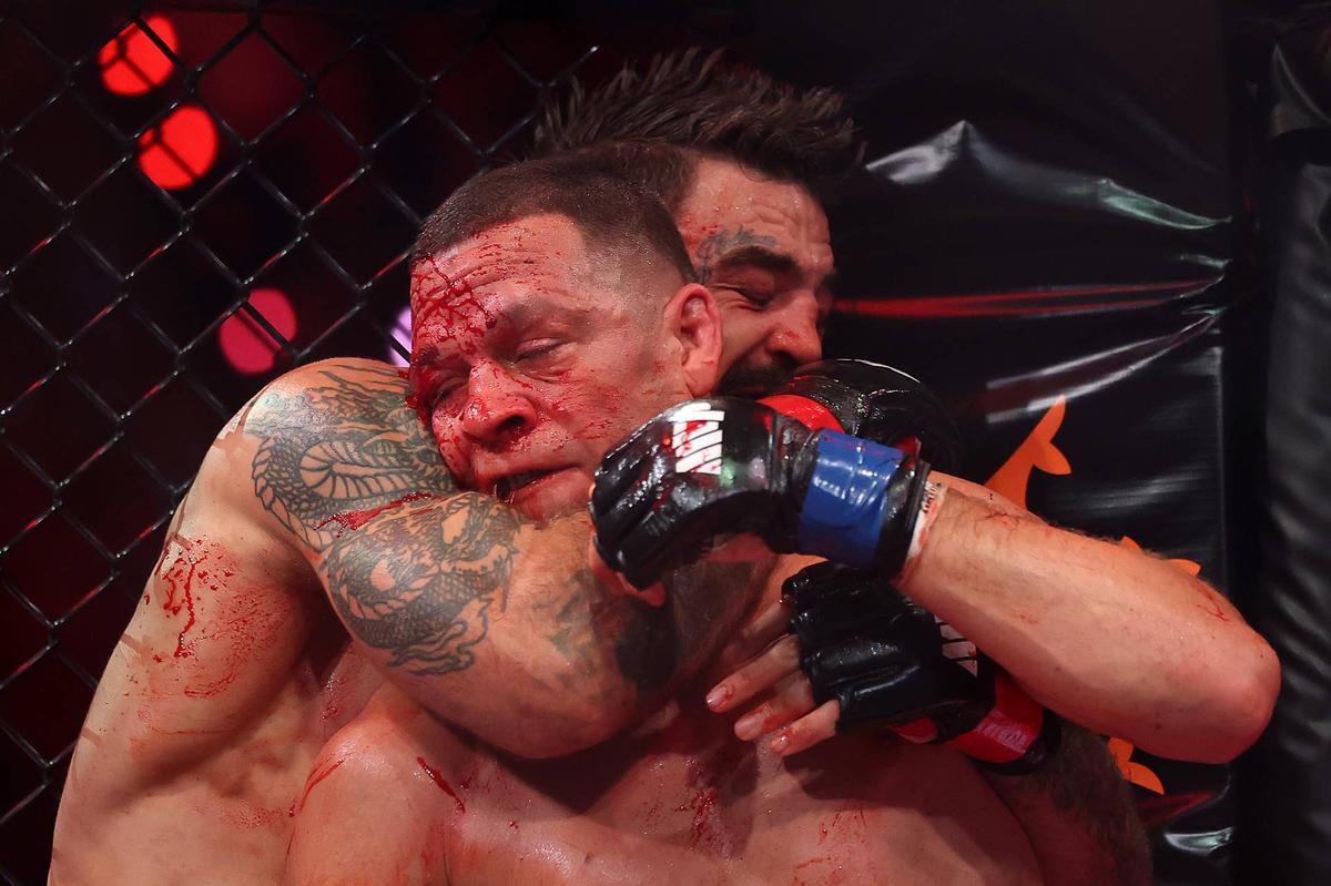  Mike Perry chokes Nate Diaz Sarah Stier/Getty Images for Netflix