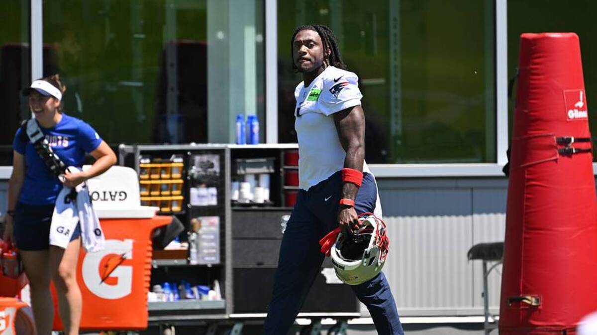  Jun 9, 2026; Foxborough, MA, USA; New England Patriots wide receiver A.J. Brown (1) arrives on the practice field for minicamp at Gillette Stadium. | Eric Canha-Imagn Images 