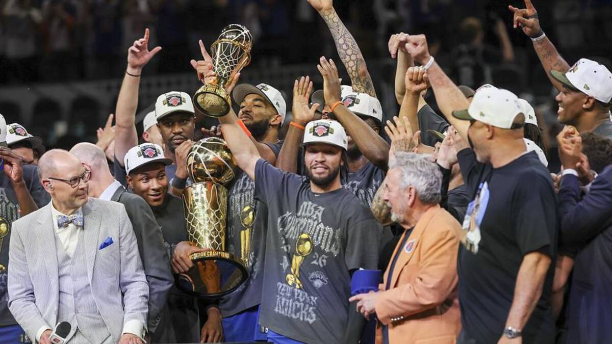  Jalen Brunson celebrates with his Knicks teammates after they won the 2026 NBA championship. | Geoff Burke-Imagn Images 