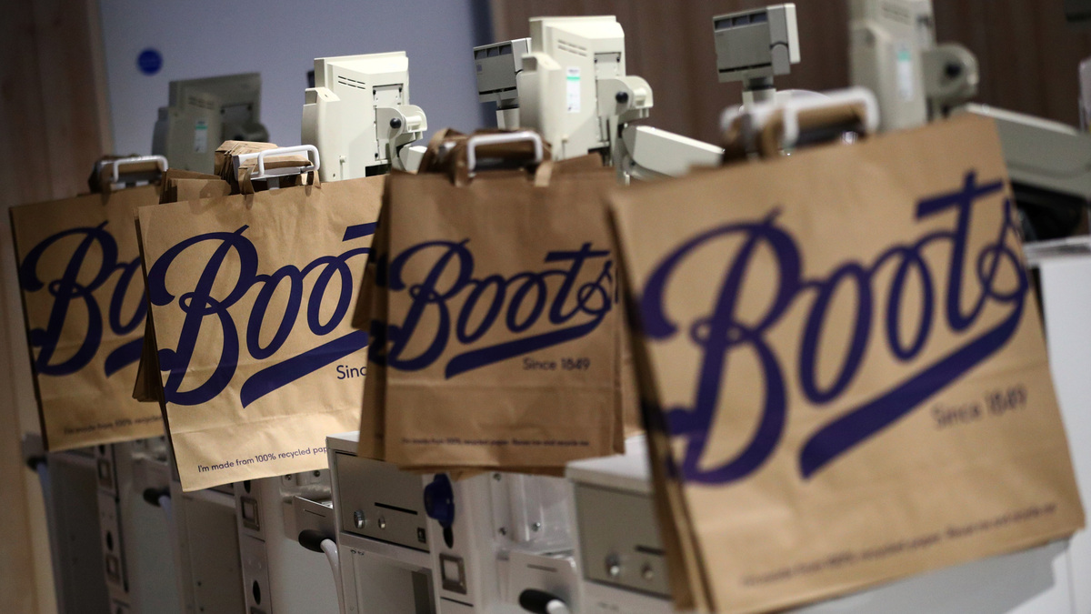 Paper carrier bags are seen in a Boots store in London, Britain June 26, 2019. REUTERS/Hannah McKay