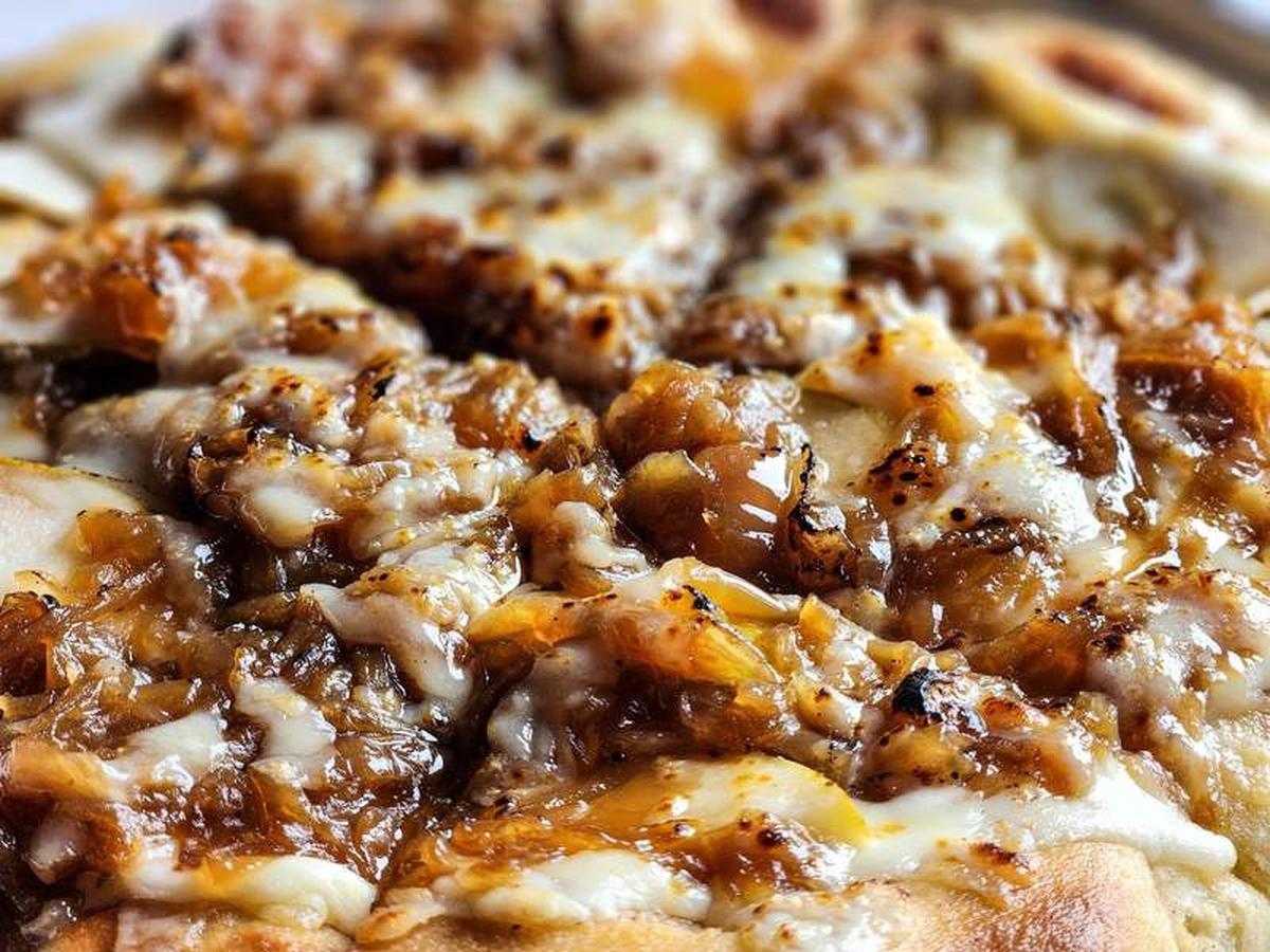  One of my favorite meals in Hood River was from the food cart at the Gorge White House. Sliced pears from the farm, caramelized onions and cheese make a sweet and tangy combination. Photo credit: June Russell-Chamberlin 