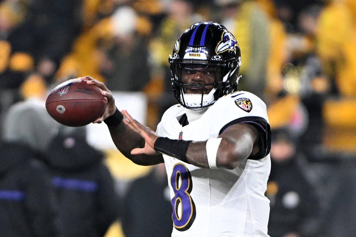  Baltimore Ravens quarterback Lamar Jackson makes a warm-up throw before a game at Acrisure Stadium. Barry Reeger-Imagn Images