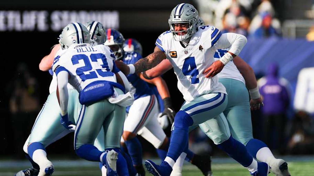  Jan 4, 2026; East Rutherford, New Jersey, USA; Dallas Cowboys quarterback Dak Prescott (4) hands the ball off to Dallas Cowboys running back Jaydon Blue (23) during the second quarter against the New York Giants at MetLife Stadium. Mandatory Credit: Vincent Carchietta-Imagn Images | Vincent Carchietta-Imagn Images 