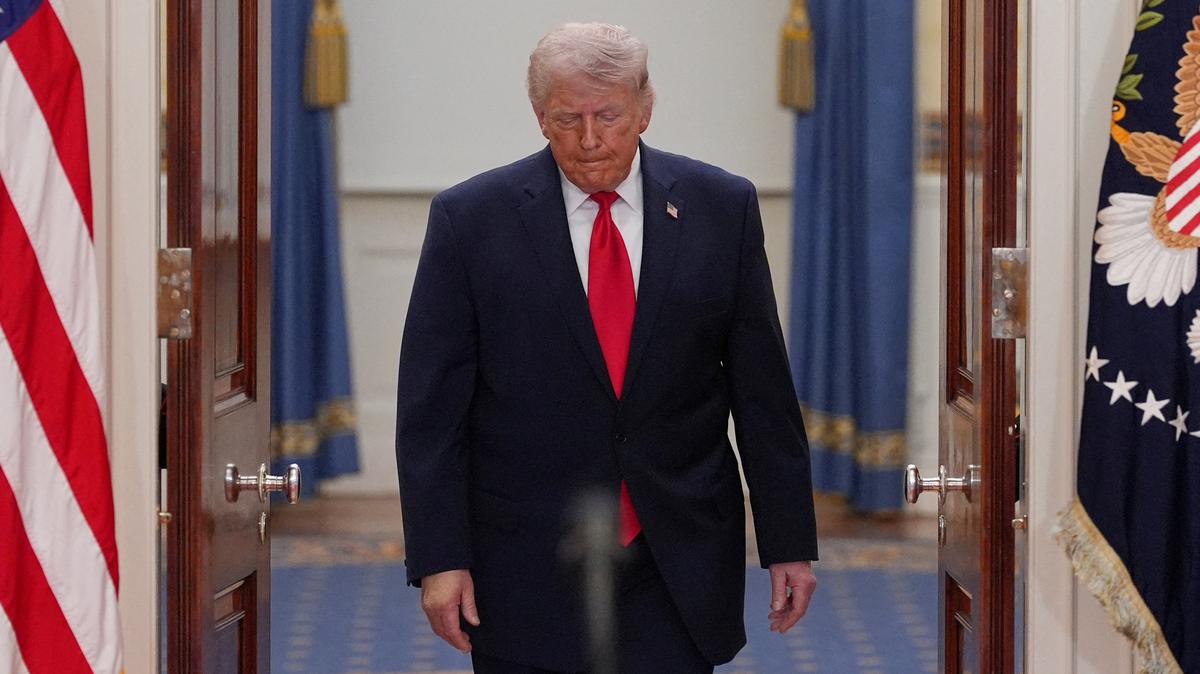 FILE PHOTO: President Donald Trump arrives to speak about the Iran war from the Cross Hall of the White House on Wednesday, April 1, 2026, in Washington. Alex Brandon/Pool via REUTERS/File Photo