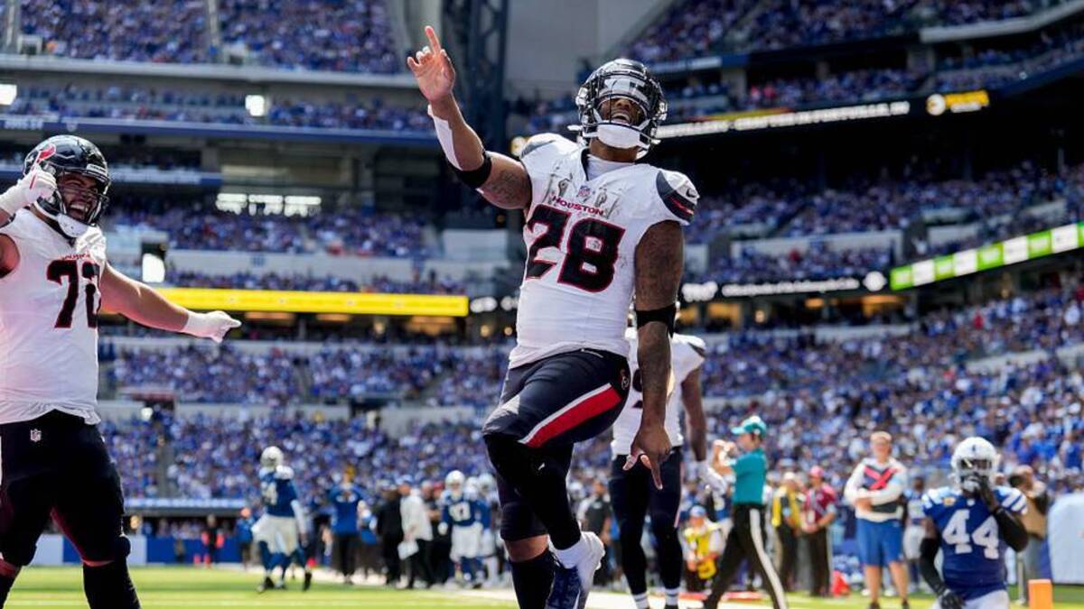  Houston Texans running back Joe Mixon (28) celebrates after scoring a touchdown Sunday, Sept. 8, 2024, during a game against the Indianapolis Colts at Lucas Oil Stadium in Indianapolis. | USA TODAY Network via Reuters Connect 