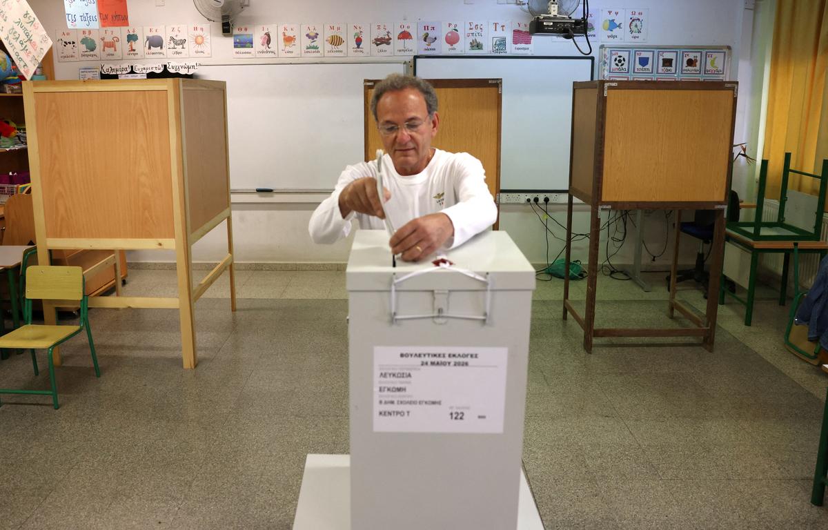 A man casts his vote during parliamentary elections at a polling station in Nicosia, Cyprus May 24, 2026. REUTERS/Yiannis Kourtoglou