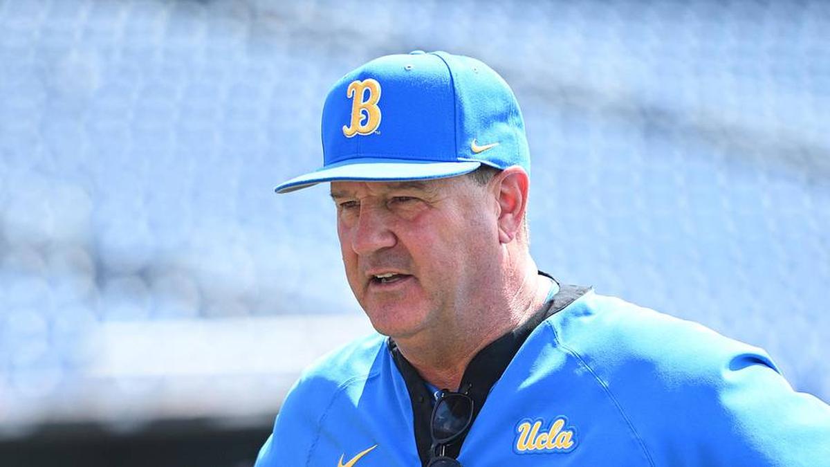  Jun 14, 2025; Omaha, Neb, USA; UCLA Bruins head coach John Savage on the field before the game against the Murray State Races at Charles Schwab Field. Mandatory Credit: Steven Branscombe-Imagn Images | Steven Branscombe-Imagn Images 