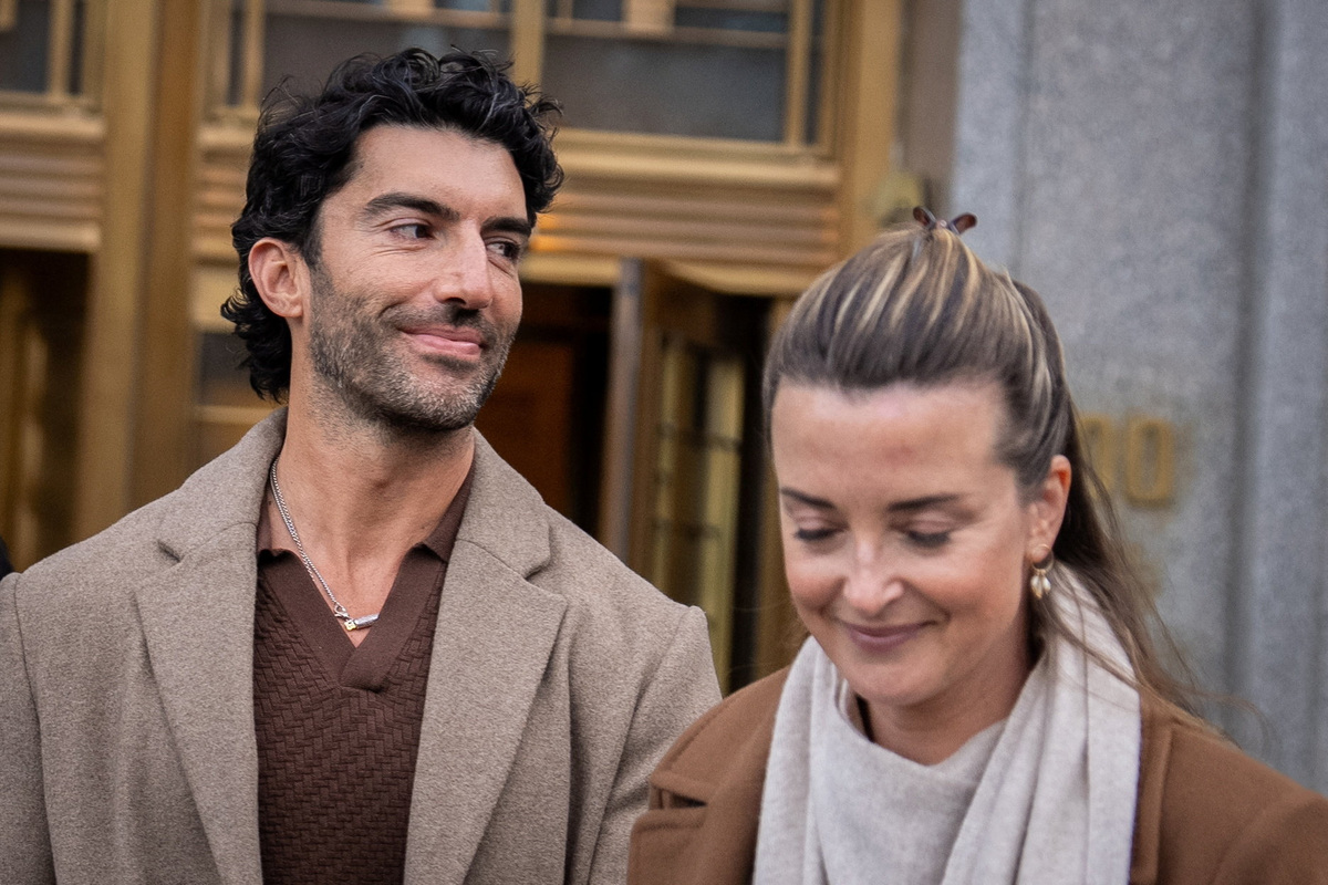 Actor Justin Baldoni and his wife Emily Baldoni depart from a 'settlement conference' at the United States District Court in New York City, U.S., February 12, 2026. REUTERS/David 'Dee' Delgado