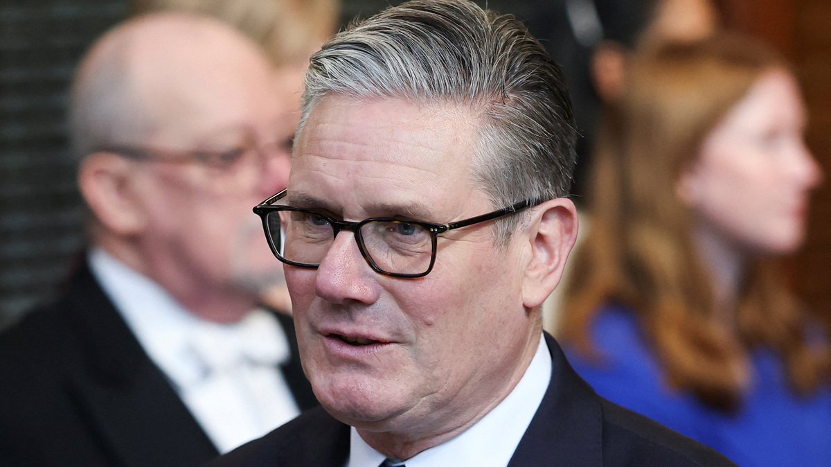 British Prime Minister Keir Starmer walks through the House of Commons to attend the State Opening of Parliament at the Palace of Westminster, London, Britain, May 13, 2026. REUTERS/Toby Melville/Pool