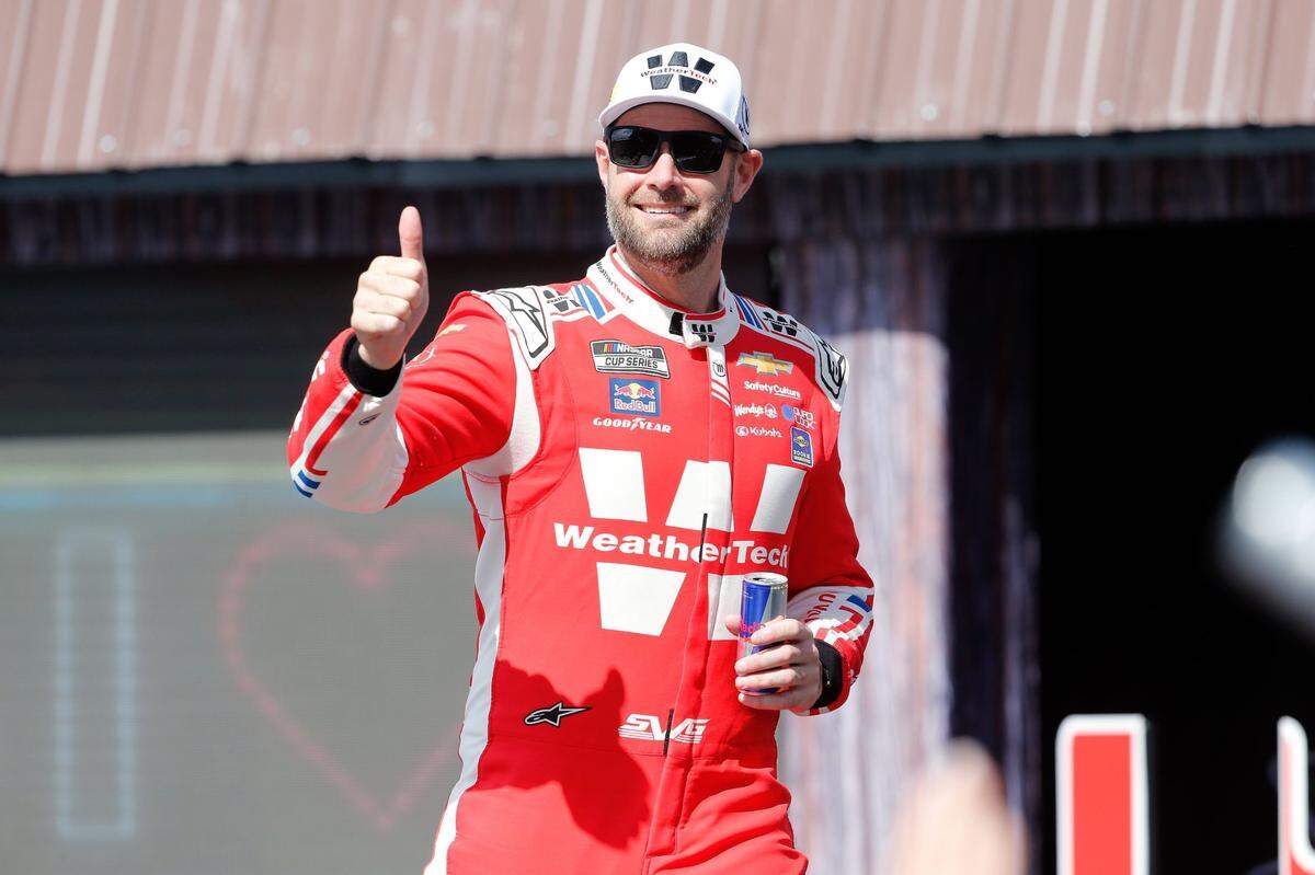 Mar 2, 2025; Austin, Texas, USA; NASCAR Cup Series driver Shane Van Gisbergen (88) walks out onto the stage for driver introductions before the EchoPark Automotive Grand Prix at Circuit of the Americas.